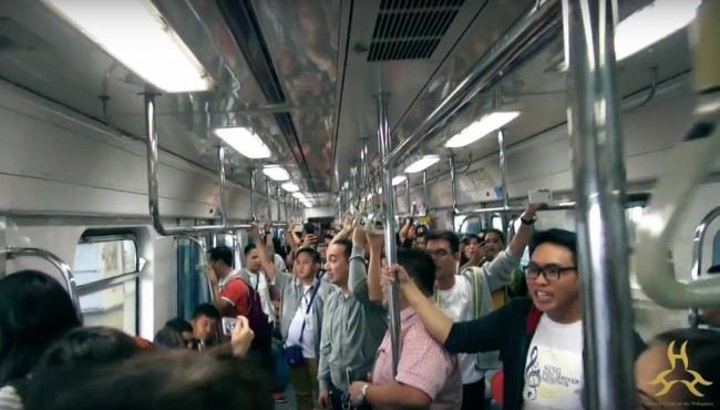 100 Youth Filipino Singers Musical Flash Mob LRT2 Commuters [VIDEO]